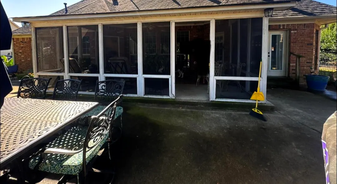 Before: Worn screened porch before it was rebuilt